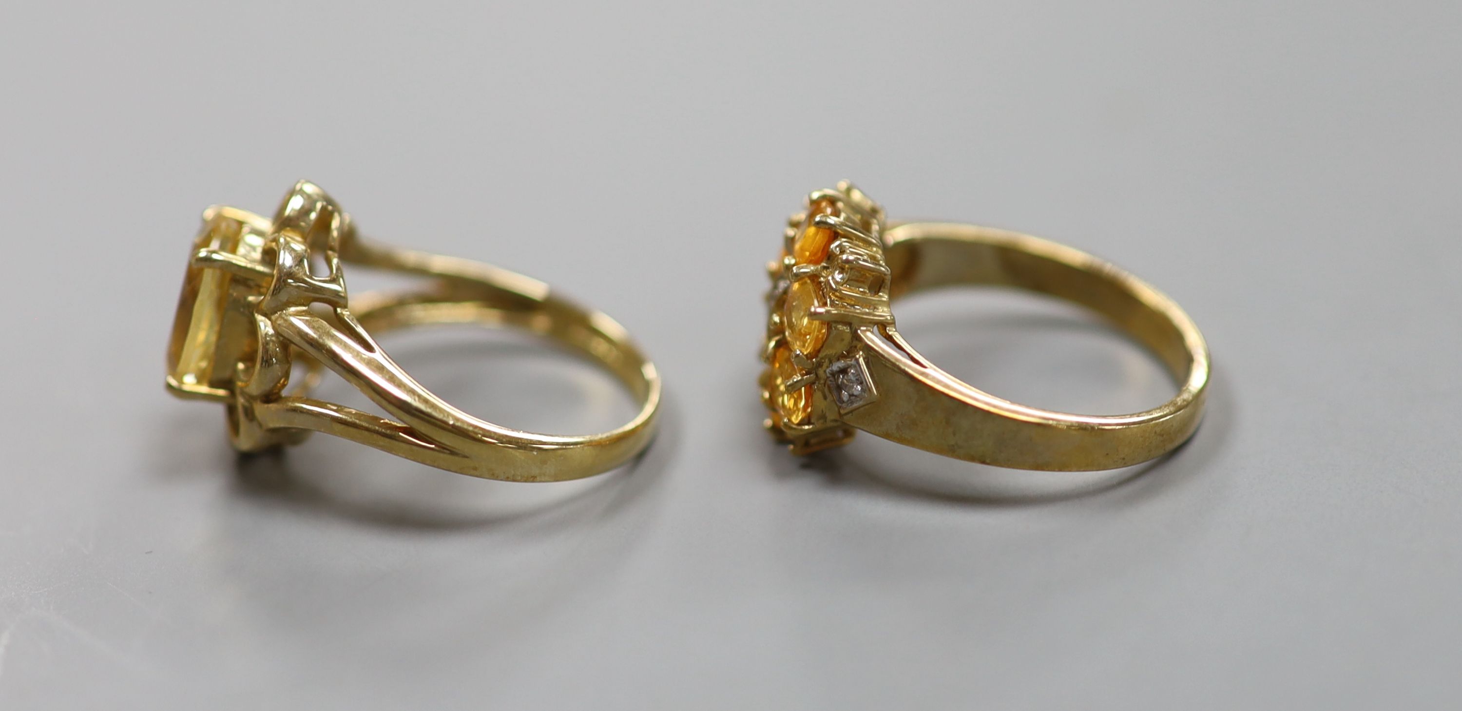 Two 9ct gold citrine set rings